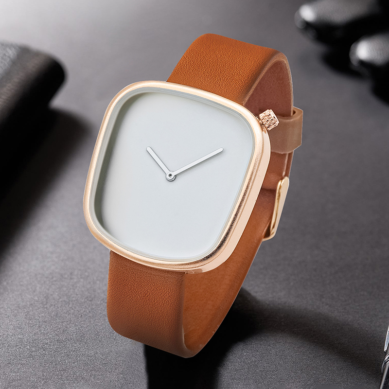 ساعة تومي الحد الأدنى للرجال م - مراجعة Canvas Strap Watch وسعره